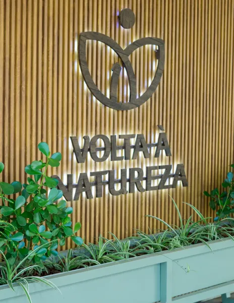 Fachada interna com a marca Volta à Natureza